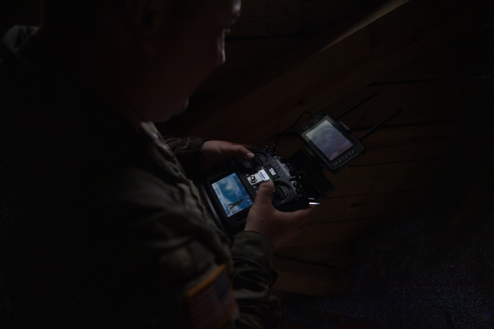 Staff Sgt. Matthew Renevier, a tactical aircraft system operator assigned to Detachment 1, Delta Company, 545th Brigade Engineer Battalion, 45th Infantry Brigade Combat Team, controls a small first-person view drone during a UAS exercise at Camp Gruber Training Center, Oklahoma, on June 12, 2025. The exercise, hosted by the 45th IBCT and featured numerous UAS and counter-UAS systems, focused on preparing infantry Soldiers to react to UAS threats. (Oklahoma National Guard photo by Staff Sgt. Anthony Jones)