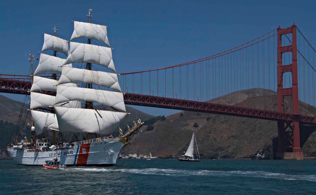 SAN FRANCISCO, (July 23, 2008) The Coast Guard Cutter Eagle sails under the Golden Gate Bridge today, leading 35 tall ships into the San Francisco Bay during the Parade of Sail. The Eagle is visiting San Francisco and five other west coast ports including Los Angeles, San Diego, Tacoma, Wash., Astoria, Ore., and Victoria, British Columbia. It has been in service with the Coast Guard since 1946 following World War II and serves as a training platform for officer candidates to learn leadership, teamwork, seamanship and navigation skills. (Coast Guard photo by Petty Officer 3rd Class Erik Swanson)
