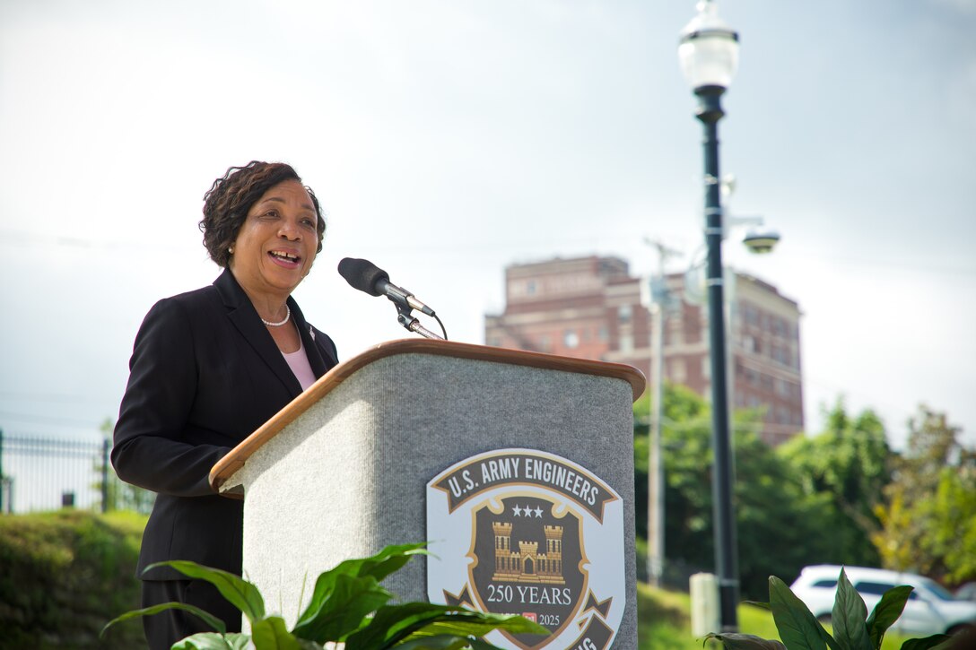 Ms. Pat Hemphill stands at podium