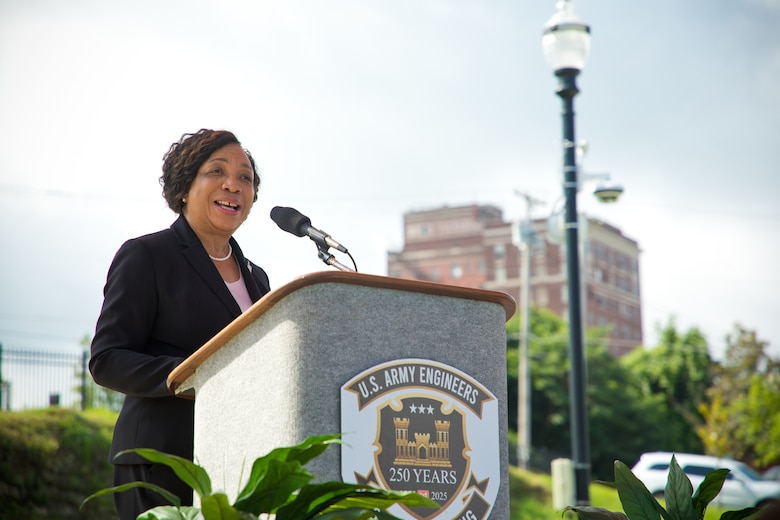 Ms. Pat Hemphill stands at podium