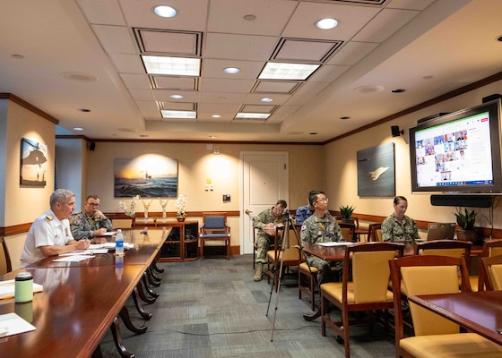 Adm. Steve Koehler, commander, U.S. Pacific Fleet, left, hosts a virtual key leader engagement with partners from 19 navies, June 17, 2025. The leaders discussed achieving maritime security in the Indo-Pacific through innovation and technology. Key leader engagements remain vitally important to ensuring a free and open Indo-Pacific by providing venues to strengthen partnerships. (U.S. Navy photo by Mass Communication Specialist 2nd Class Christopher Sypert)