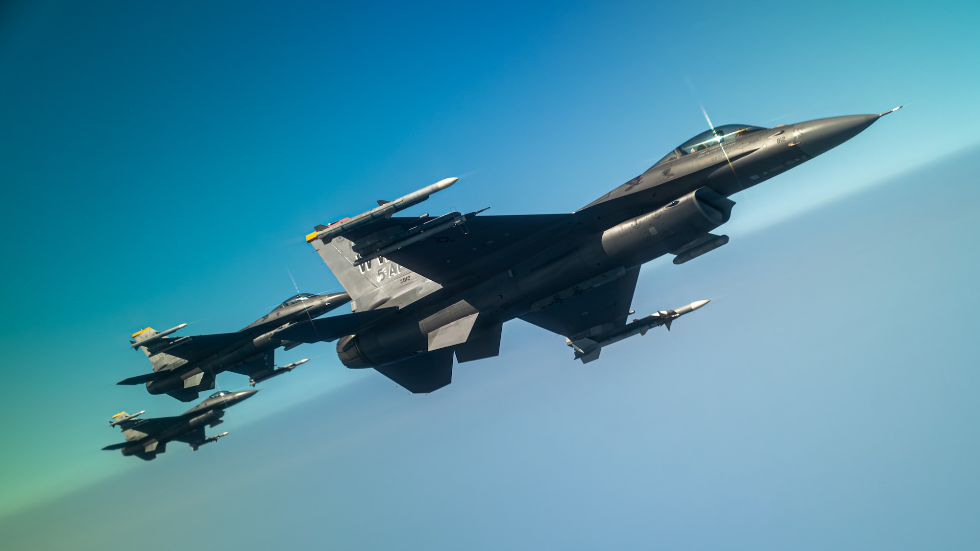3 F-16s fly