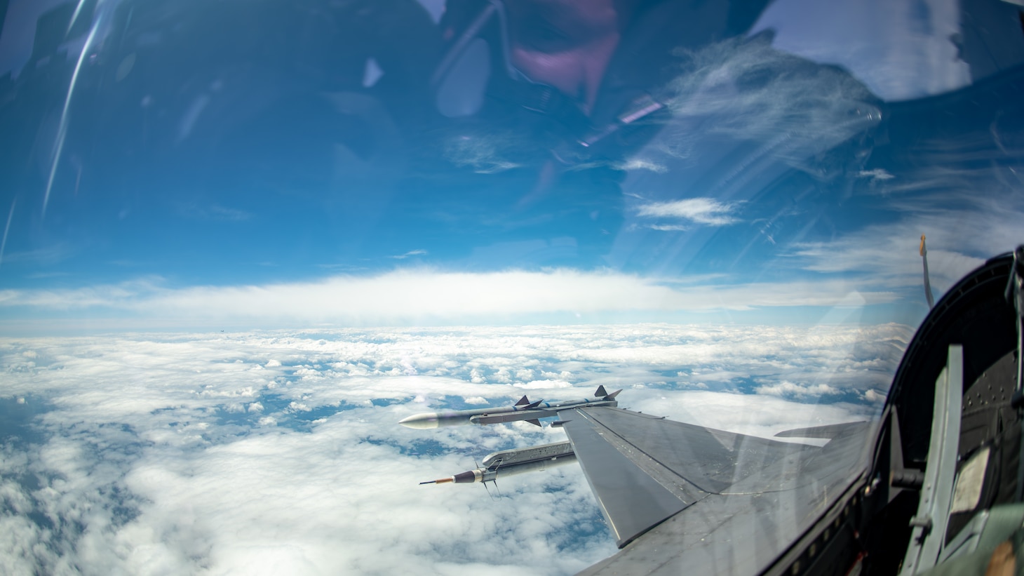 Clouds are seen from an F-16