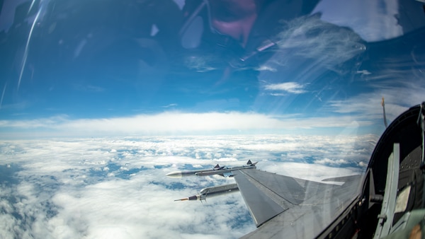 Clouds are seen from an F-16