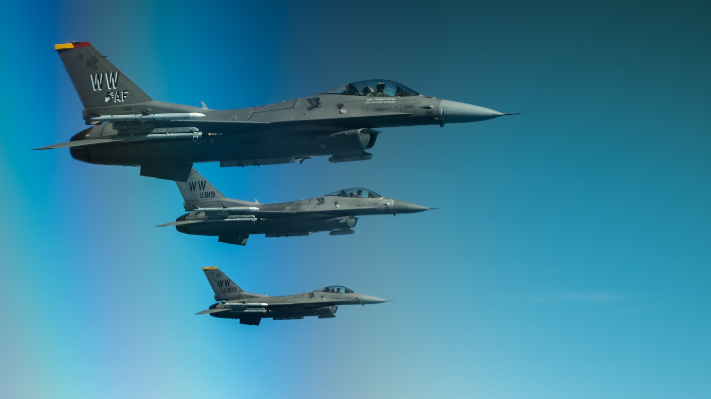 3 F-16s fly