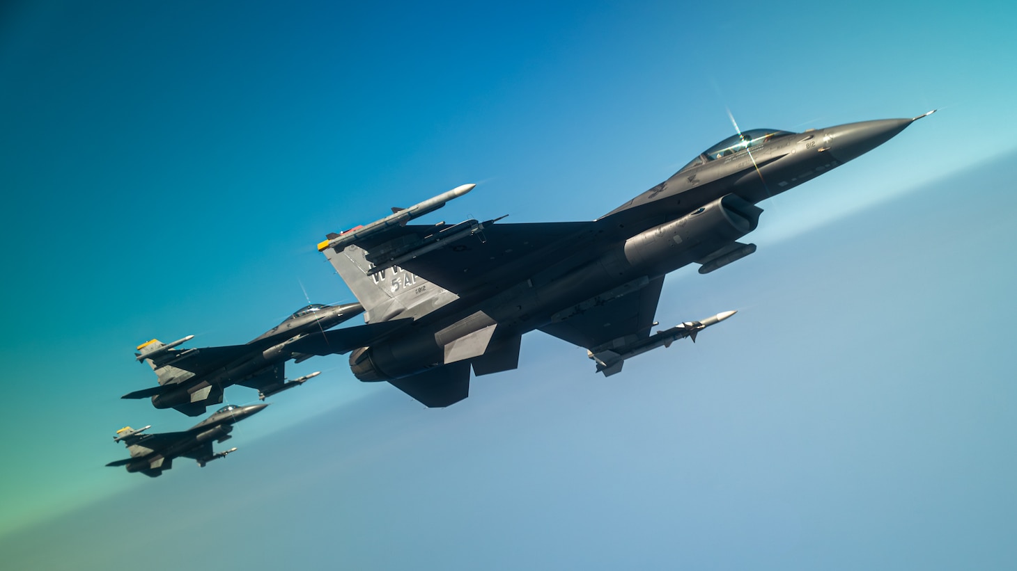 3 F-16s fly