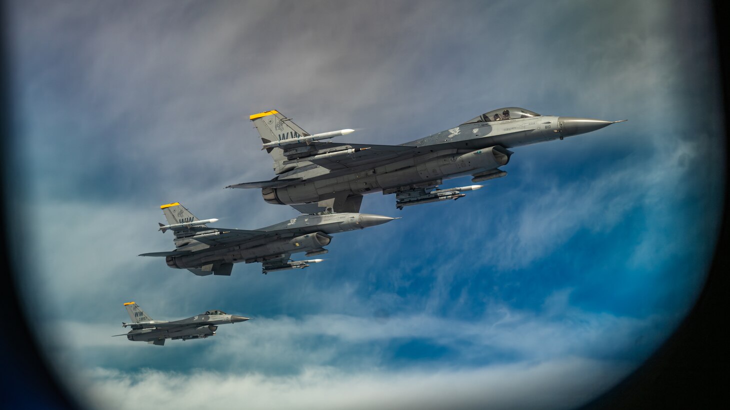 3 F-16s fly
