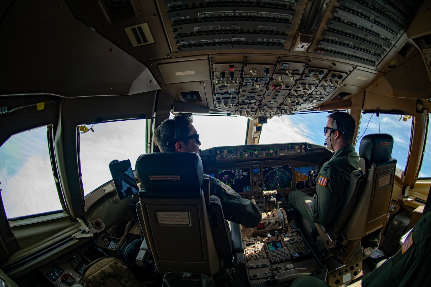 Flight deck of a KC-46 is shown with 2 pilots