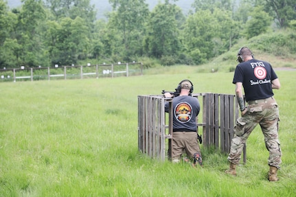 U.S. Army Col. Kevin D. Potts fires at steel targets during the 2025 FTIG 2-Gun Steel Shoot at Fort Indiantown Gap, Pennsylvania, June 14, 2025.