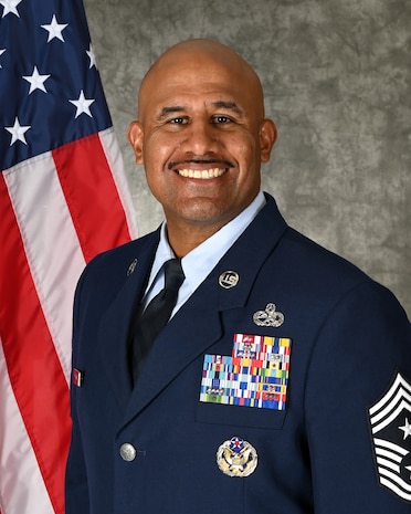 An updated official photo for the 350th Spectrum Warfare Wing command chief, Chief Master Sgt. Jose Ramon Jr.