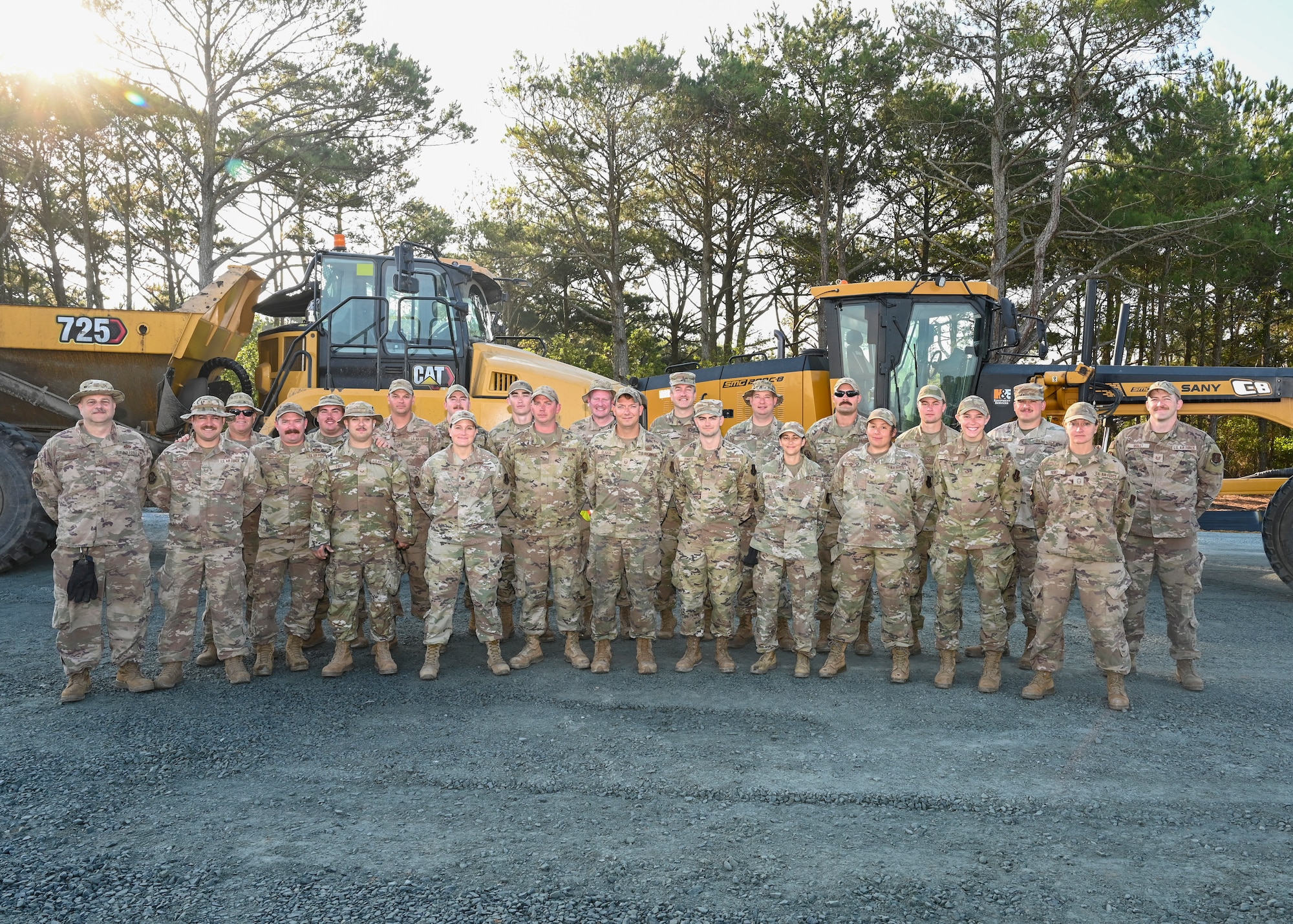Pennsylvania Air National Guardsmen, assigned to the 171st Civil Engineer Squadron pose for a photo during a deployment for training, Assateague Island, Virginia, June 18, 2025. The 171st engineers are the 5th rotation of 8 during the deployment for training on the island. The DFT has provided engineers with unique training consistent with installing a runway while creating a new road for the Fish and Wildlife Service. (U.S. Air National Guard photo by Senior Master Sgt. Bryan Hoover)