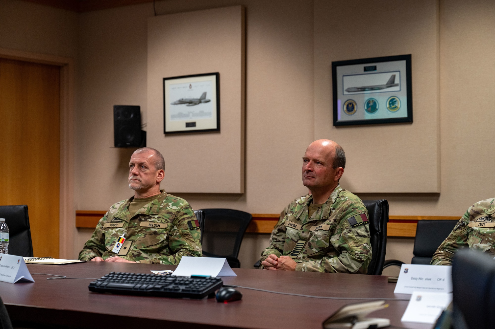 Belgian Armed Forces Gen. Frederik Vansina, right, Belgian Chief of Defence, and Brig. Gen. Bart Verbist, Embassy of the Kingdom of Belgium Defence Attaché,  receive a briefing about Red Flag-Alaska during a visit to Eielson Air Force Base, Alaska, June 19, 2025.