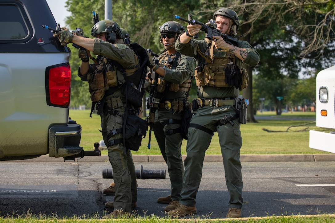 U.S. Marines with Marine Corps Base Quantico Provost Marshal Office’s special reaction teams maintain security during an active shooter response exercise on MCBQ, June 11, 2025. Quantico hosted a multi-jurisdictional active shooter exercise designed to strengthen first responders capabilities in emergency response and public safety operations to improve interagency communication and coordination. (U.S. Marine Corps photo by Lance Cpl. Federico Marquez)