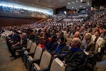 Guests, international partners, families and friends fill King Hall Auditorium to celebrate Naval Postgraduate School’s spring quarter graduating class, June 18. (U.S. Navy photo by Mass Communication Specialist 2nd Class Andrew Langholf)