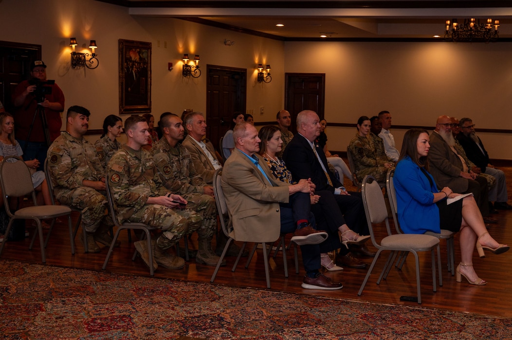 Members of both the San Angelo and Goodfellow Air Force Base community attend the Memorandum of Understanding signing event at the LeGrand Visitors and Alumni Center, San Angelo Texas, June 18, 2025. The ongoing partnerships between the San Angelo community and Goodfellow AFB have generate widespread benefits, enhancing educational opportunities and cultivating innovation within the region. (U.S. Air Force photo by Airman 1st Class James Salellas)
