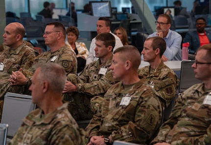 Military and community partners listen to briefings during distinguished visitors' day at the Cyber Tatanka exercise June 12, 2025, at the University of Nebraska-Lincoln.