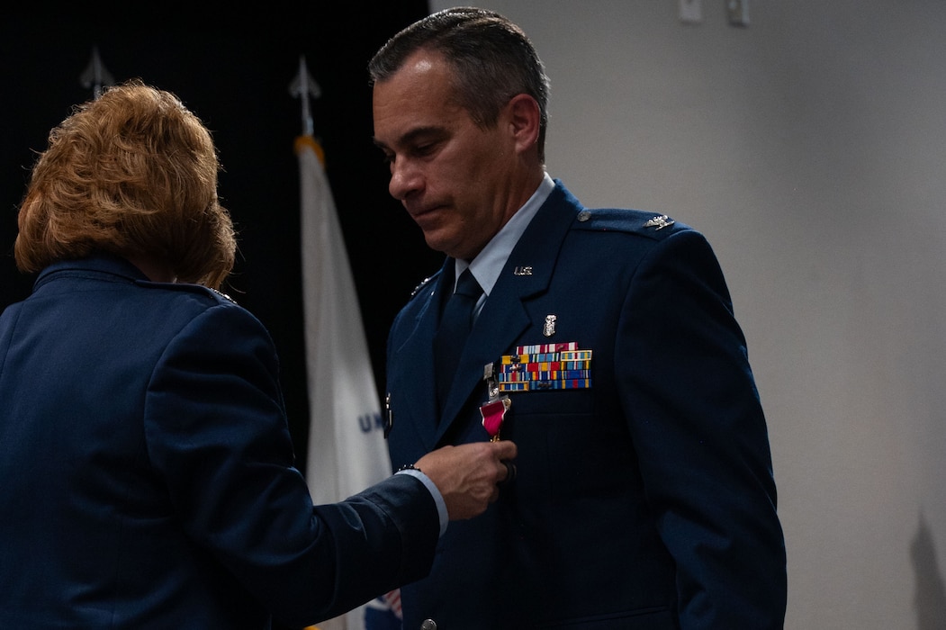 U.S. Air Force Col. Ian Rybchznski, outgoing 17th Medical Group commander,
receives the Legion of Merit during the change of command ceremony at the Powell Event Center, Goodfellow Air Force Base, Texas, June 18, 2025. Rybczynski led over 200 military, civilian and contract staff that serve 11,500 beneficiaries and 14,000 students in a community-based healthcare system in support of the 17th Training Wing. (U.S. Air Force photo by Airman 1st Class Brian Lummus)