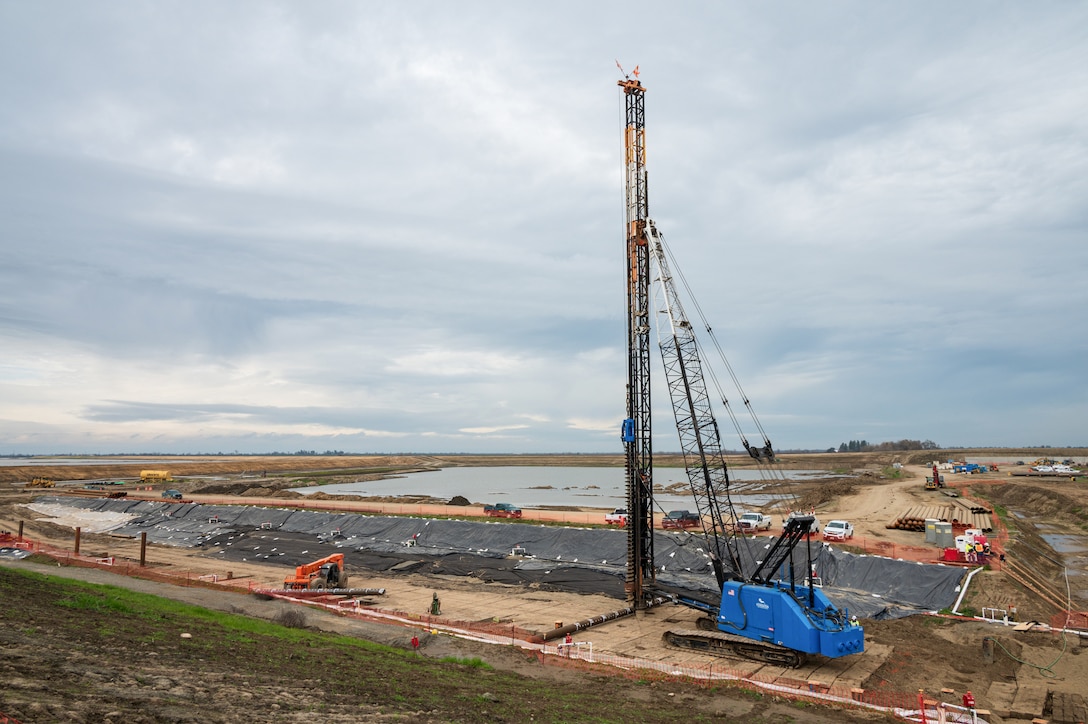 Early construction of the Sacramento Weir fish passage structure on Feb. 14, 2024, shows the initial phases of what will become an 8,600-foot "double hybrid technical fishway" managed by the U.S. Army Corps of Engineers Sacramento District. The innovative structure will allow endangered salmon, steelhead and sturgeon to safely navigate through flood control infrastructure during high-water events. Upon completion, this state-of-the-art system will be the first of its kind in California to accommodate both salmon and large sturgeon up to 10 feet in length