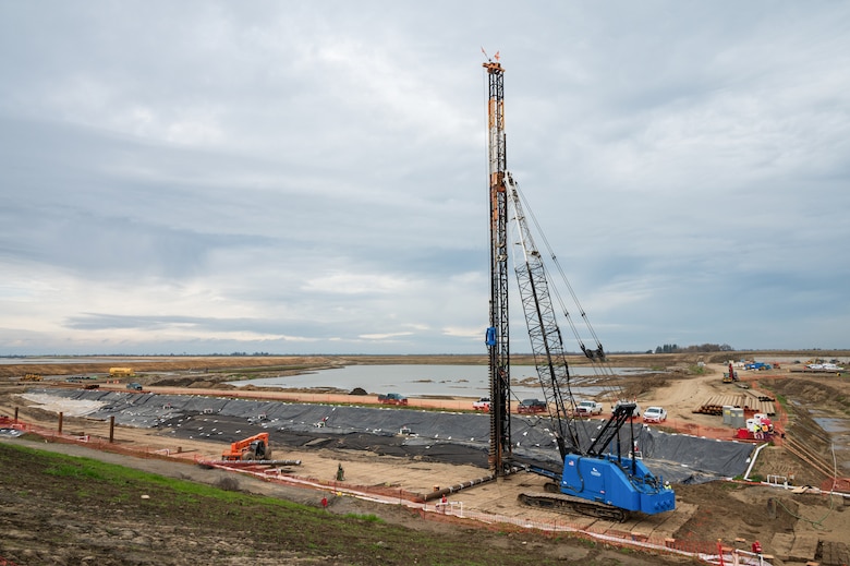 Early construction of the Sacramento Weir fish passage structure on Feb. 14, 2024, shows the initial phases of what will become an 8,600-foot "double hybrid technical fishway" managed by the U.S. Army Corps of Engineers Sacramento District. The innovative structure will allow endangered salmon, steelhead and sturgeon to safely navigate through flood control infrastructure during high-water events. Upon completion, this state-of-the-art system will be the first of its kind in California to accommodate both salmon and large sturgeon up to 10 feet in length