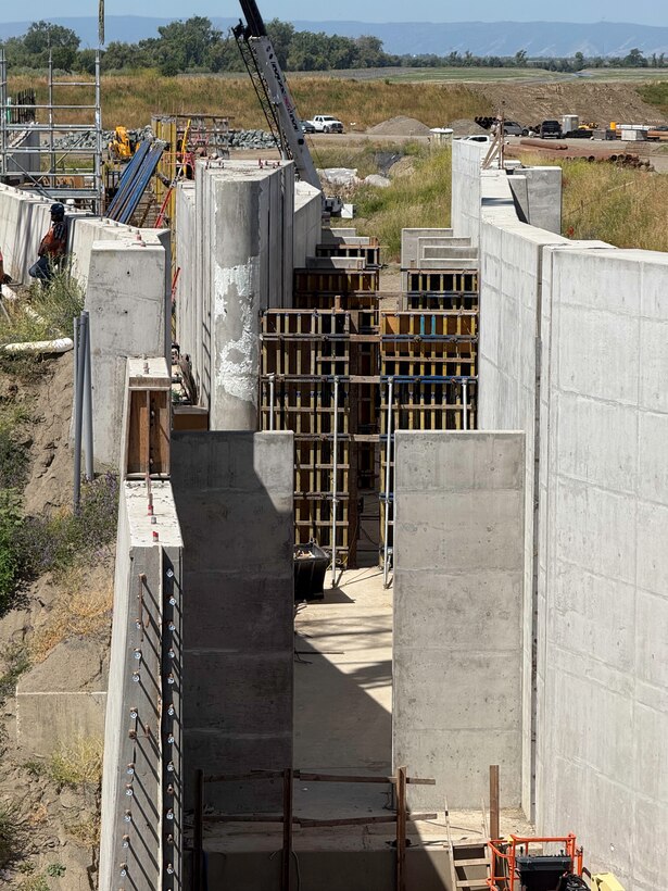 A view looking through the Sacramento Weir fish passage shows the series of baffles installed along the channel on May 14, 2025. The baffle system is designed to create manageable water flows for endangered salmon, steelhead and sturgeon up to 10 feet long as they navigate through the structure managed by the U.S. Army Corps of Engineers Sacramento District. The "double hybrid technical fishway" will allow fish to safely pass through flood control infrastructure during high-water events.