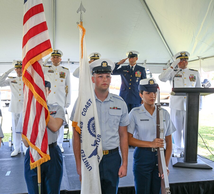 A U.S. Coast Guard color guard presents colors during a change of command ceremony held at U.S. Coast Guard Sector Key West, June 20, 2025. The change of command ceremony marks the transfer of total responsibility and authority from one officer to another. (U.S. Coast Guard photo by Petty Officer 2nd Class Eric Rodriguez)