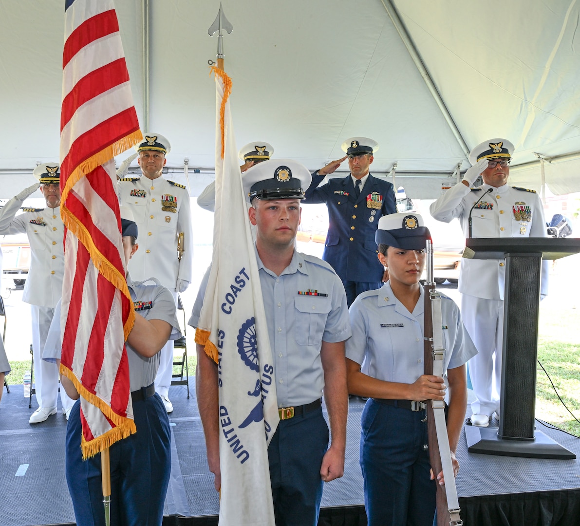 A U.S. Coast Guard color guard presents colors during a change of command ceremony held at U.S. Coast Guard Sector Key West, June 20, 2025. The change of command ceremony marks the transfer of total responsibility and authority from one officer to another. (U.S. Coast Guard photo by Petty Officer 2nd Class Eric Rodriguez)
