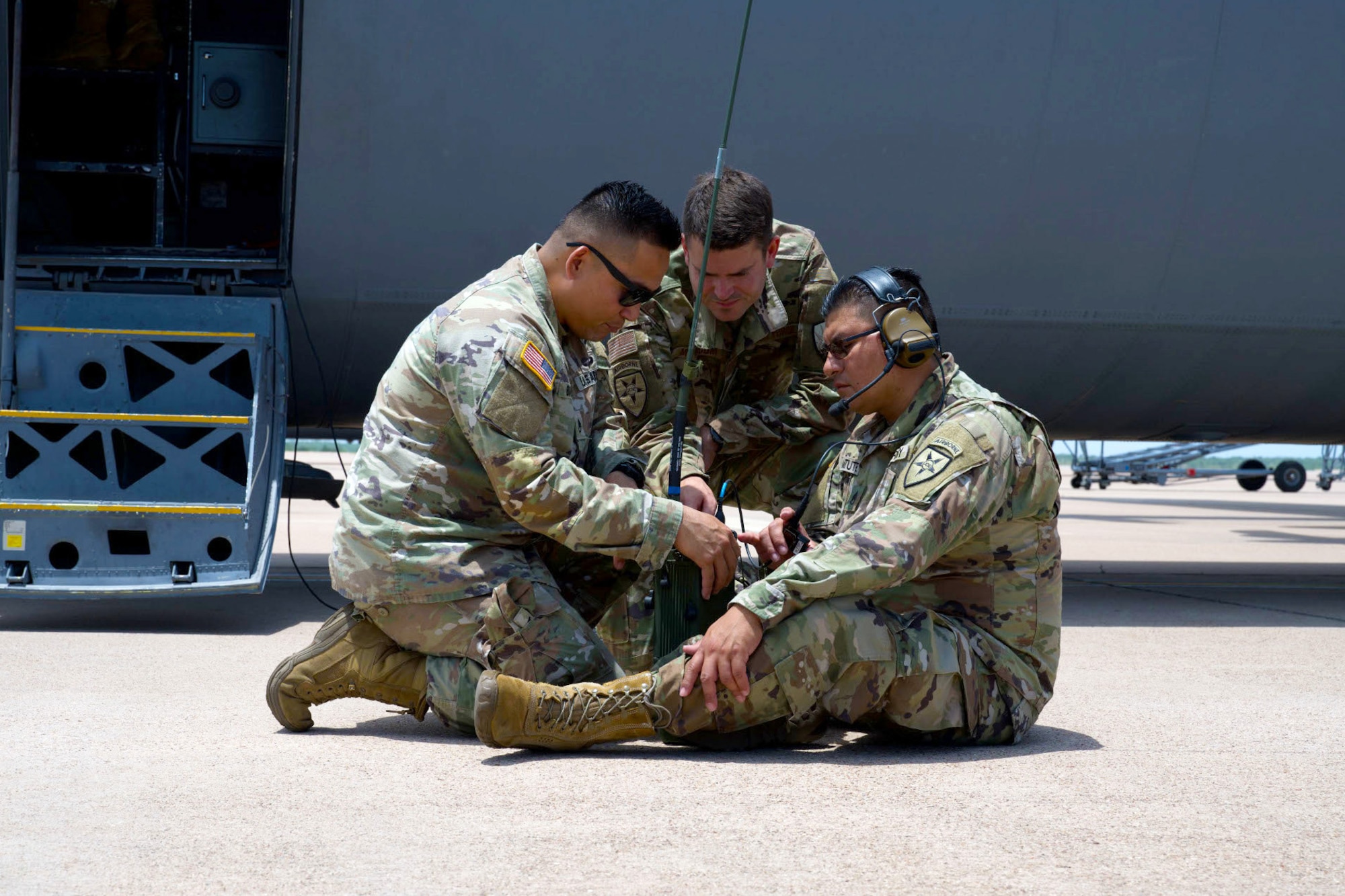 Joint Deployable Airborne Package enroute engineers with the 4th Joint Communications Support Element conduct operational checks with a high frequency radio at Dyess Air Force Base, Texas, June 2, 2025. The 317th Airlift Wing tested advanced communication hardware for the C-130J Super Hercules aircraft, enhancing situational awareness and command connectivity. (U.S. Air Force photo by Senior Airman Emma Anderson)