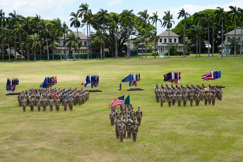 Soldiers assigned to the 3d Multi-Domain Task Force stand in formation during the unit’s change of command ceremony on historic Palm Circle at Fort Shafter, Hawaii, June 18, 2025. (U.S. Army photo by Sgt. Perla Alfaro)
