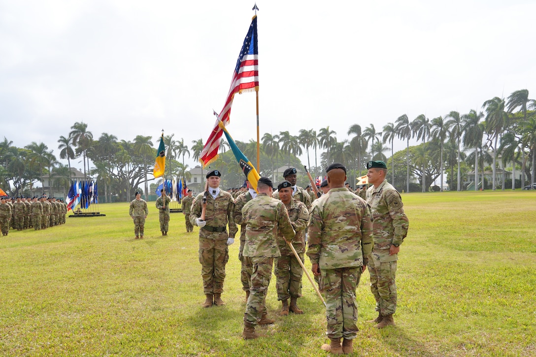The 3d Multi-Domain Task Force conducts a change of command ceremony on historic Palm Circle at Fort Shafter, Hawaii, June 18, 2025, marking the formal transition of leadership from Brig. Gen. Michael D. Rose to Col. Wade A. Germann through the traditional passing of the unit colors. (U.S. Army photo by Sgt. Perla Alfaro)