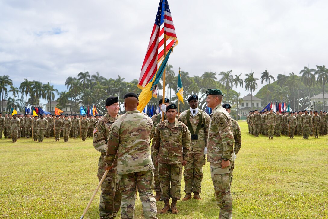 The 3d Multi-Domain Task Force conducts a change of command ceremony on historic Palm Circle at Fort Shafter, Hawaii, June 18, 2025, marking the formal transition of leadership from Brig. Gen. Michael D. Rose to Col. Wade A. Germann through the traditional passing of the unit colors. (U.S. Army photo by Sgt. Perla Alfaro)