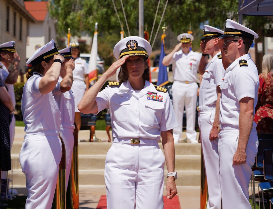 SAN DIEGO (June 17, 2025) Capt. Franca Jones, commander, Naval Medical Research Command, passes through side boys at the Naval Health Research Center (NHRC) change of command ceremony in which Capt. Eric Welsh was relieved by Capt. Kellie McMullen as commanding officer. NHRC, part of Navy Medicine Research & Development, supports Navy, Marine Corps, and joint U.S. warfighter health readiness and lethality with research and development that delivers high-value, high-impact solutions to the health and readiness challenges U.S. military population faces on the battlefield, at-sea, home and abroad. (U.S. Navy photo by Danielle Cazarez)