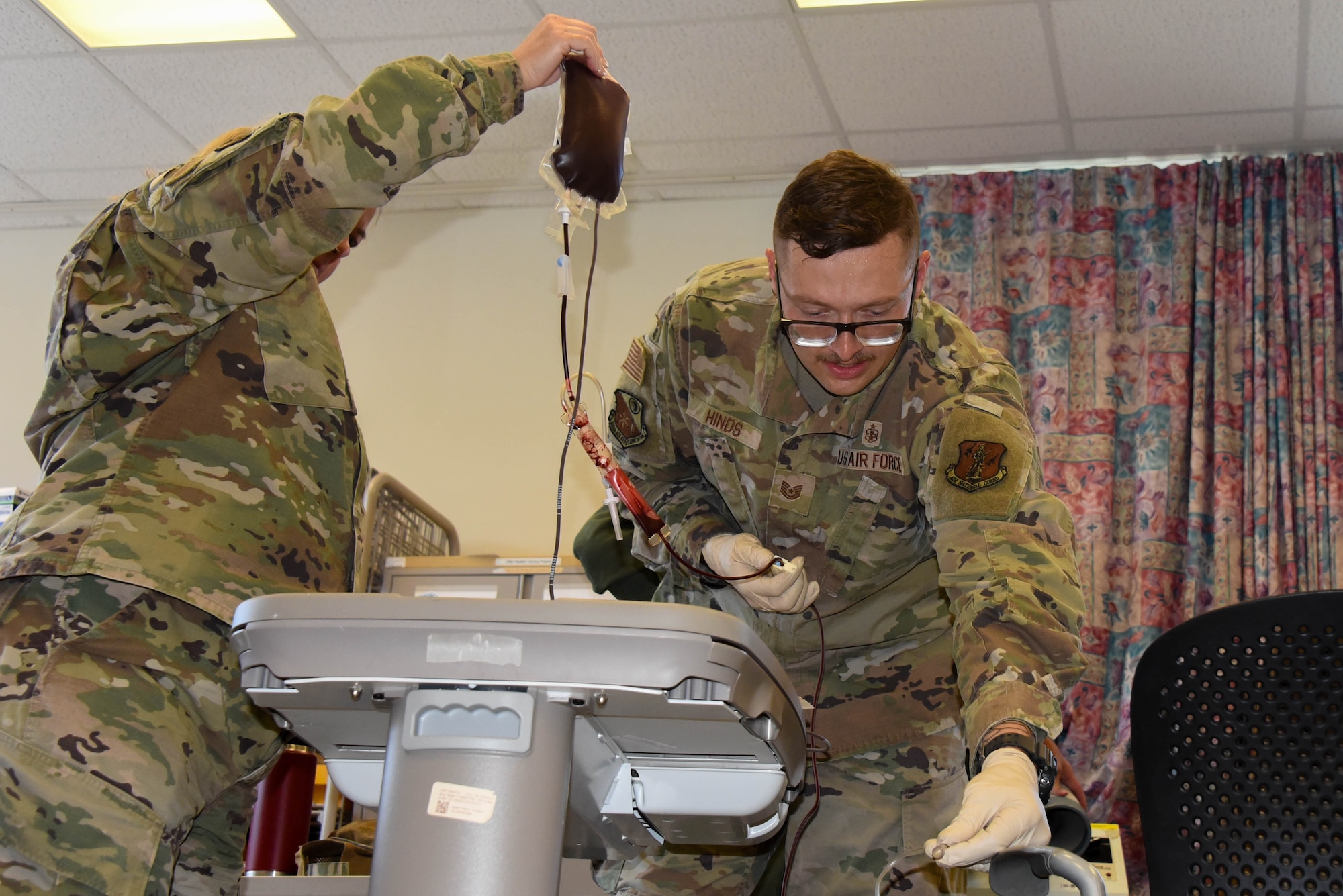 Tech Sgt. Dylan Hinds, 185th Air Refueling Wing Medical Group Nurse performs a blood transfusion.