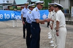 U.S. Coast Guard Capt. Brian Krautler, left, commanding officer of the Legend-class U.S. Coast Guard Cutter Stratton (WMSL 752), shakes hands with members of the Japanese coast guard at a welcome ceremony in Kagoshima, Japan, June 16, 2025, during a trilateral exercise with Japan and Philippine Coast Guard. Stratton is deployed and assigned to Destroyer Squadron (DESRON) 15, the Navy’s largest DESRON and the U.S. 7th Fleet’s principal surface force. Stratton is deployed to the Indo-Pacific to advance relationships with ally and partner nations to build a more secure and prosperous region with unrestricted, lawful access to the maritime commons. (U.S. Coast Guard photo by Petty Officer 2nd Class Kate Kilroy)