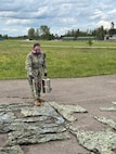 Hospital Corpsman 2nd Class Alexis Rivera, assigned to Navy Environmental Preventive Medicine Unit (NEPMU) 7, applies permethrin treatment to uniforms at a field site during BALTOPS25 in Skrunda, Latvia, June 19, 2025. BALTOPS 25 is the premier maritime-focused annual military exercise in the Baltic region and provides a unique opportunity to strengthen warfighting readiness and combat credibility critical to deterrence and preserving safety and security in the Baltic Sea.