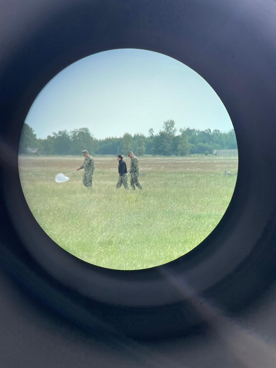 Lt. Xuan Li, Lt. Randy Buckley, and Hospital Corpsman 1st Class Nicolas Garhartt, assigned to Navy Environmental Preventive Medicine Unit TWO (NEPMU-2), conduct vector surveillance operations through open terrain during BALTOPS25 in Rinkaby, Sweden, June 19, 2025. BALTOPS 25 is the premier maritime-focused annual military exercise in the Baltic region and provides a unique opportunity to strengthen warfighting readiness and combat credibility critical to deterrence and preserving safety and security in the Baltic Sea.