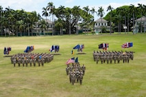 Soldiers assigned to the 3d Multi-Domain Task Force stand in formation during the unit’s change of command ceremony on historic Palm Circle at Fort Shafter, Hawaii, June 18, 2025. (U.S. Army photo by Sgt. Perla Alfaro)