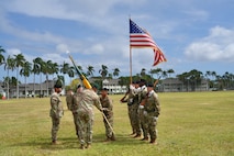 The 3d Multi-Domain Task Force conducts a change of command ceremony on historic Palm Circle at Fort Shafter, Hawaii, June 18, 2025, marking the formal transition of leadership from Brig. Gen. Michael D. Rose to Col. Wade A. Germann through the traditional passing of the unit colors. (U.S. Army photo by Sgt. Perla Alfaro)