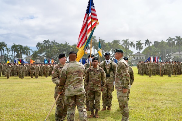 The 3d Multi-Domain Task Force conducts a change of command ceremony on historic Palm Circle at Fort Shafter, Hawaii, June 18, 2025, marking the formal transition of leadership from Brig. Gen. Michael D. Rose to Col. Wade A. Germann through the traditional passing of the unit colors. (U.S. Army photo by Sgt. Perla Alfaro)