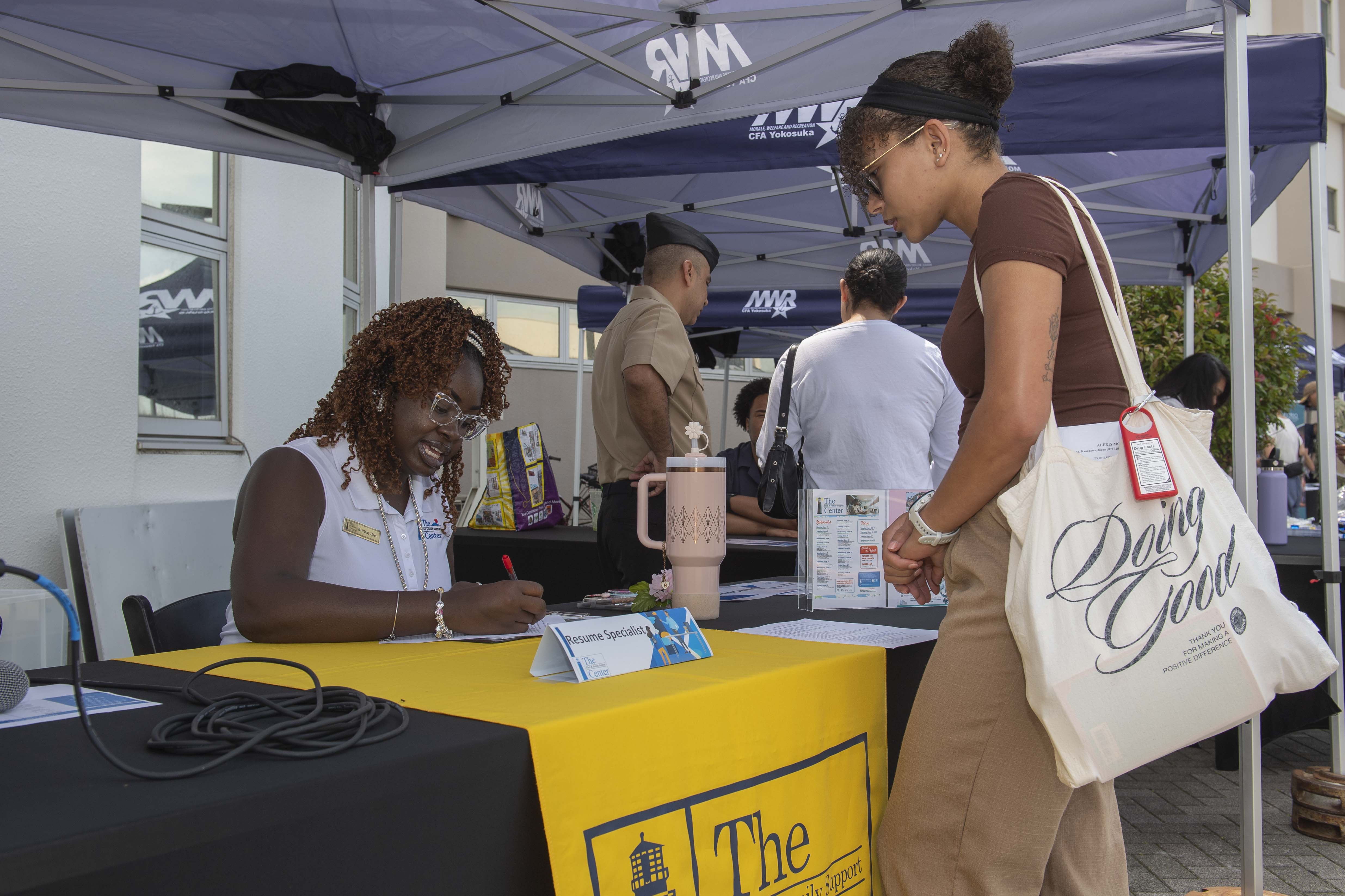 Commander, Fleet Activities Yokosuka base community members register for the Fleet and Family Support Center (FFSC) Career Fair at Commander, Fleet Activities Yokosuka.