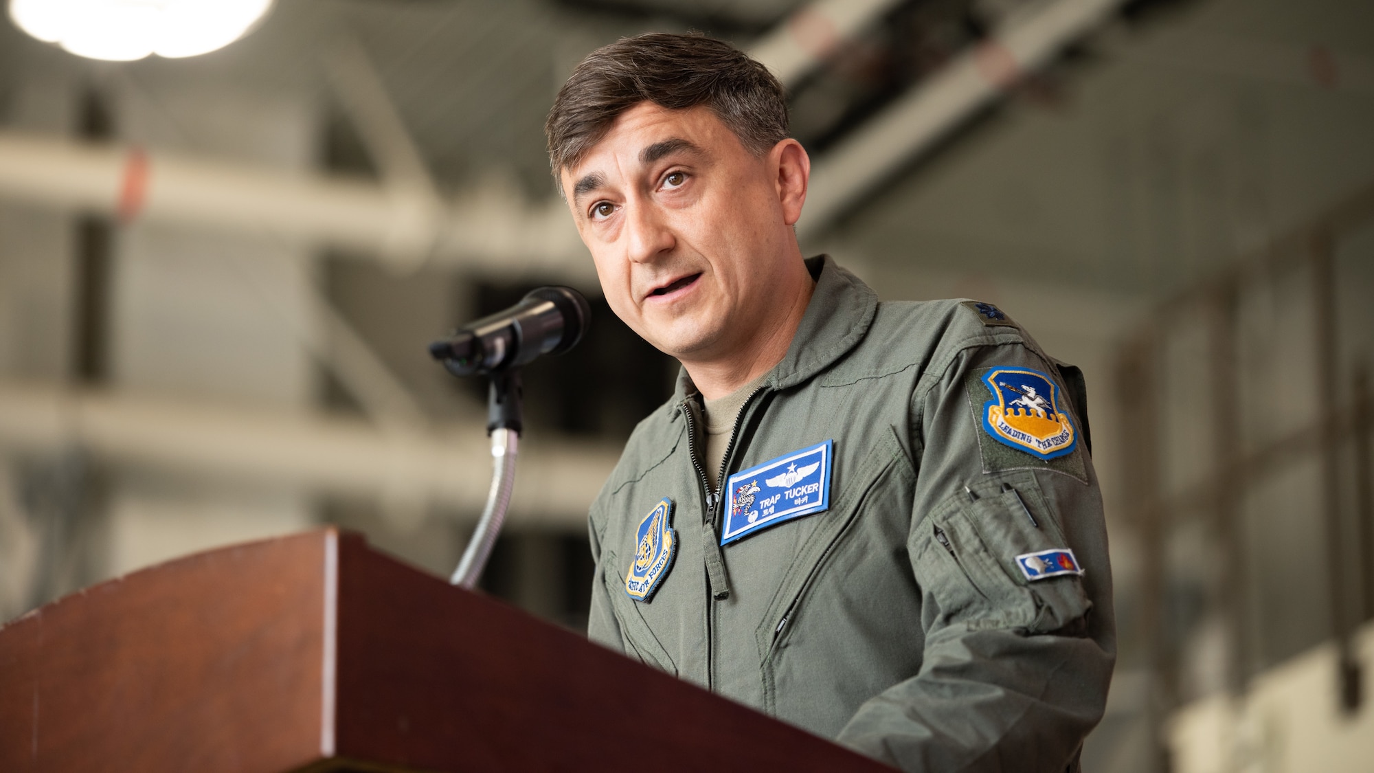 U.S. Air Force Lt. Col. Lance Tucker, incoming 51st Operations Support Squadron commander, delivers his first remarks to the squadron during a Change of Command ceremony at Osan Air Base, Republic of Korea, June 18, 2025.