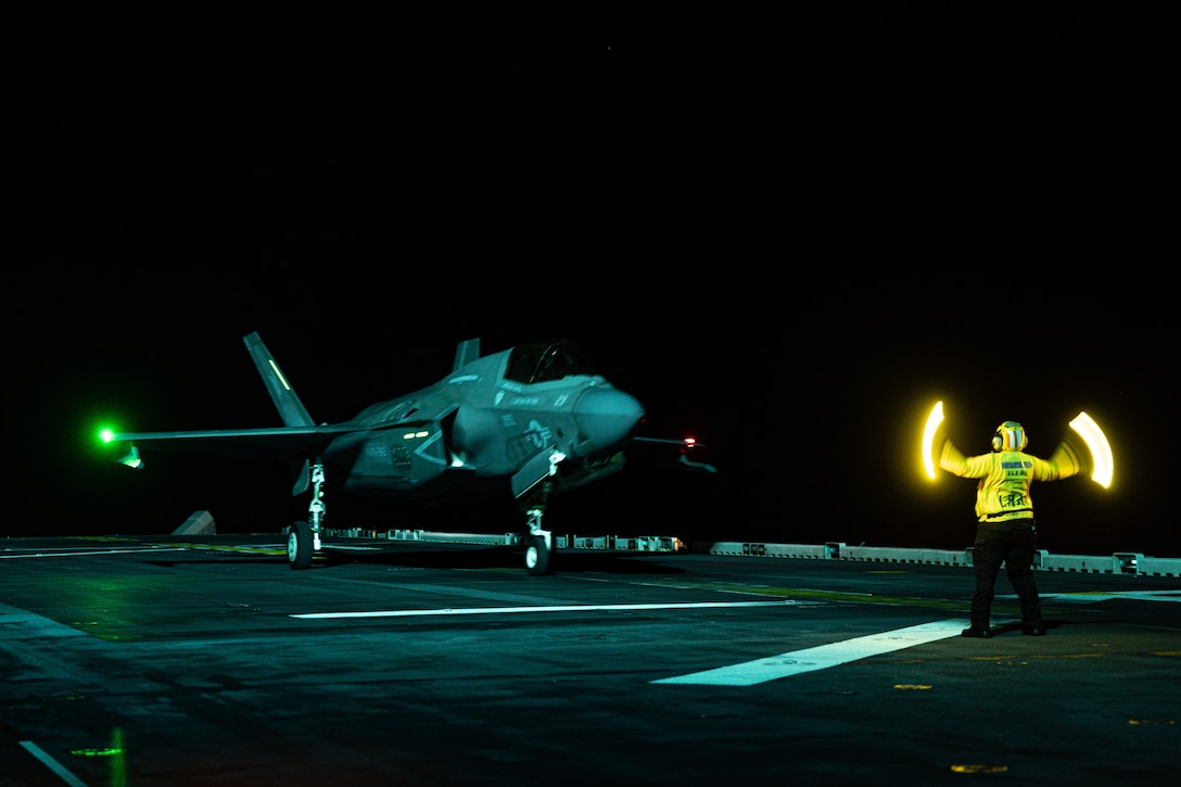 A U.S. Marine Corps F-35B Lightning II aircraft assigned to Marine Fighter Attack Squadron (VMFA) 242, 31st Marine Expeditionary Unit, taxis on the flight deck during flight operations aboard the amphibious assault ship USS America (LHA 6), in the Coral Sea, June 19, 2025. Marine F-35Bs bring a 5th generation multi-discipline strike capability to support combined-joint all domain operations in key maritime terrain. The 31st MEU is operating aboard ships of the USS America Amphibious Ready Group in the 7th Fleet area of operations, the U.S. Navy’s largest forward deployed numbered fleet, and routinely interacts and operates with allies and partners in preserving a free and open Indo-Pacific region. (U.S. Marine Corps photo by Lance Cpl. Gerardo Mendez)