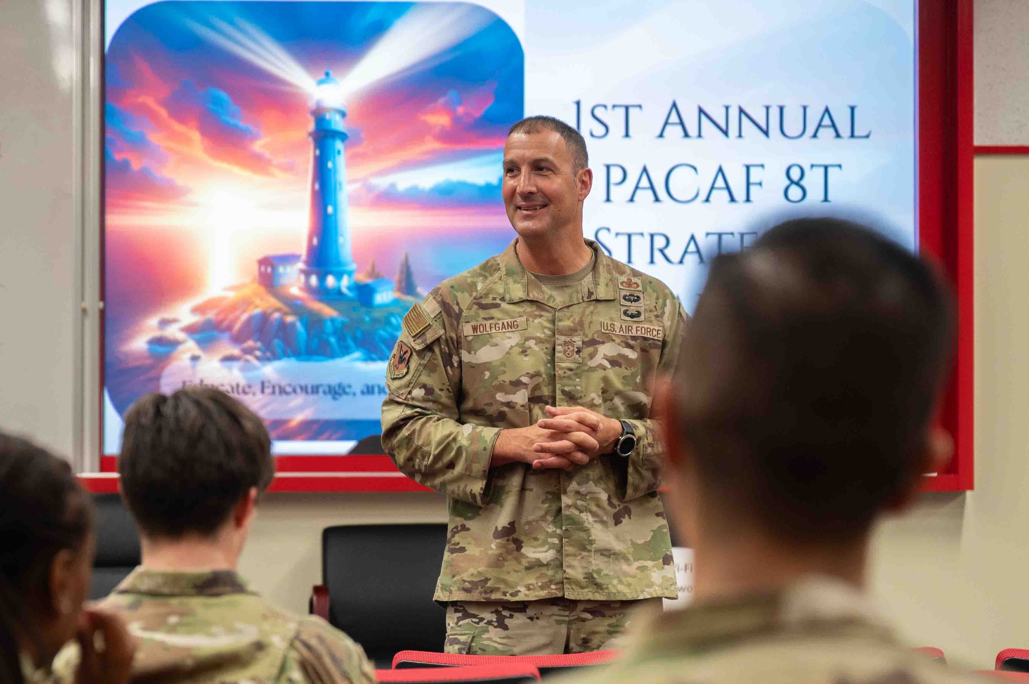 Service member speaks during a development event.