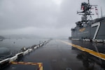 SASEBO, Japan (June 23, 2025) – The America-class amphibious assault ship USS Tripoli (LHA 7) arrives in Sasebo, Japan June 23, 2025. USS Tripoli (LHA 7) is forward deployed to Sasebo, Japan, and operates in U.S. 7th Fleet, the U.S. Navy’s largest forward-deployed numbered fleet, which routinely interacts and operates with allies and partners in preserving a free and open Indo-Pacific region. (U.S. Navy photo by Mass Communication Specialist 1st Class Danian C. Aiko-Douglas)