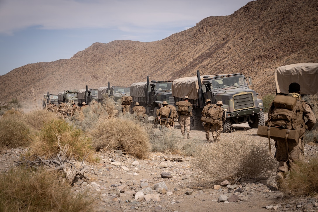 U.S. Marines with 1st Battalion, 23rd Marine Regiment, 4th Marine Division depart a range at Integrated Training Exercise 3-25 (ITX 3-25) at Marine Corps Air Ground Combat Center, Twentynine Palms, California, June 13th, 2025. ITX is a critical Marine Air-Ground Task Force exercise for the Marine Forces Reserve’s training cycle, confirming unit readiness through live-fire and combined arms integration. (U.S. Marine Corps photo by Lance Cpl. Edward Spears)