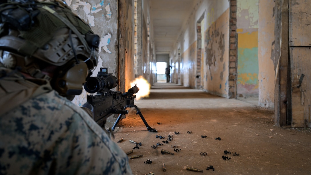 U.S. Marines with 2d Light Armored Reconnaissance Battalion, 2nd Marine Division execute close quarters battle training during exercise Baltic Operations 2025 in Skrunda, Latvia, June 19, 2025. BALTOPS 25, the premier maritime-focused exercise in the Baltic Region, provides a unique training opportunity to strengthen combined response capabilities critical to preserving freedom of navigation and security in the Baltic Sea. (U.S. Marine Corps photo by Sgt. Alyssa Chuluda)