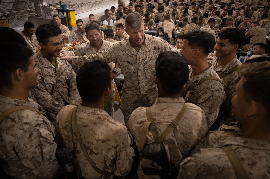 U.S. Marine Corps Brig. Gen. John K. Jarrard, commanding general of 4th Marine Division, speaks to Marines with 1st Battalion, 23rd Marine Regiment at Integrated Training Exercise 3-25 (ITX 3-25) at Marine Corps Air Ground Combat Center, Twentynine Palms, California, June 15th, 2025. ITX is a critical Marine Air-Ground Task Force exercise for the Marine Forces Reserve’s training cycle, confirming unit readiness through live-fire and combined arms integration. (U.S. Marine Corps photo by Lance Cpl. Edward Spears)