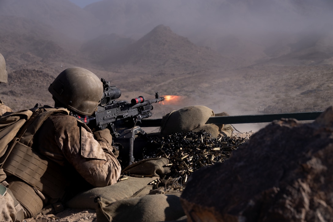 A U.S. Marine with 2nd Battalion, 23rd Marine Regiment, 4th Marine Division fires an M240 machine gun at Range 400 during Integrated Training Exercise 3-25 (ITX 3-25) at Marine Corps Air Ground Combat Center, Twentynine Palms, California, June 15th, 2025. ITX is a critical Marine Air-Ground Task Force exercise for the Marine Forces Reserve’s training cycle, confirming unit readiness through live-fire and combined arms integration. (U.S. Marine Corps photo by Lance Cpl. Edward Spears)