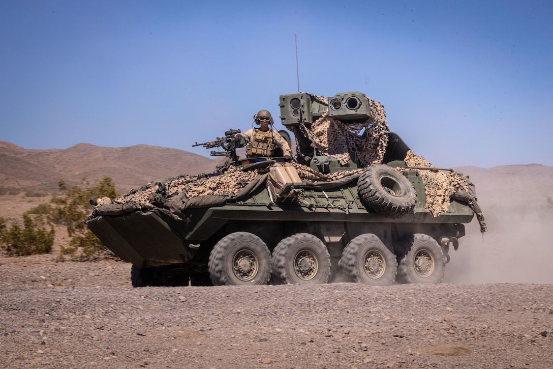 U.S. Marines with 4th Light Armored Reconnaissance Battalion, 4th Marine Division drive a Light Armored Vehicle 25 during a live-fire event at Integrated Training Exercise 3-25 (ITX 3-25) at Marine Corps Air Ground Combat Center, Twentynine Palms, California, June 16th, 2025. ITX is a critical Marine Air-Ground Task Force exercise for the Marine Forces training cycle, confirming unit readiness through live-fire and combined arms integration. (U.S. Marine Corps photo by Lance Cpl. Edward Spears)