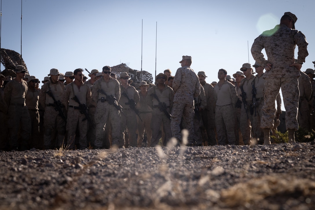 U.S. Marine Corps Brig. Gen. John K. Jarrard, commanding general of 4th Marine Division, speaks to Marines with 4th Light Armored Reconnaissance Battalion, 4th Marine Division at Integrated Training Exercise 3-25 (ITX 3-25) at Marine Corps Air Ground Combat Center, Twentynine Palms, California, June 16th, 2025. ITX is a critical Marine Air-Ground Task Force exercise for the Marine Forces Reserve’s training cycle, confirming unit readiness through live-fire and combined arms integration. (U.S. Marine Corps photo by Lance Cpl. Edward Spears)