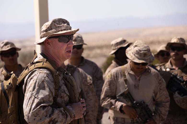 U.S. Navy Lt. Cmdr. Jason Wiesepape, a chaplain with 25th Marine Regiment, 4th Marine Division, speaks to Marines during Integrated Training Exercise 3-25 (ITX 3-25) at Marine Corps Air Ground Combat Center, Twentynine Palms, California, June 5th, 2025. Chaplains develop force readiness by guiding Marines both spiritually and mentally in harsh environments. ITX is a critical Marine Air-Ground Task Force exercise for the Marine Forces Reserve’s training cycle, confirming unit readiness through live-fire and combined arms integration. (U.S. Marine Corps photo by Lance Cpl. Edward Spears)